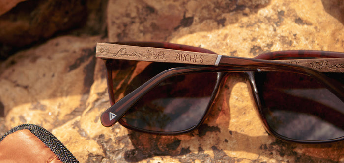 CAMP Crag Sunglasses Arches Edition close up showing engraved Arches on the wooden temple