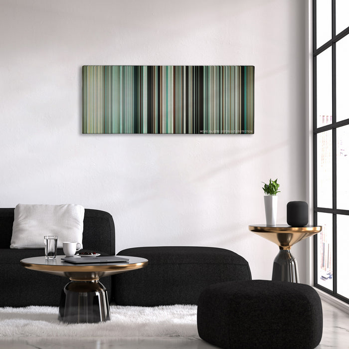 Dunkirk color palette canvas above a black sofa with a gold-topped table