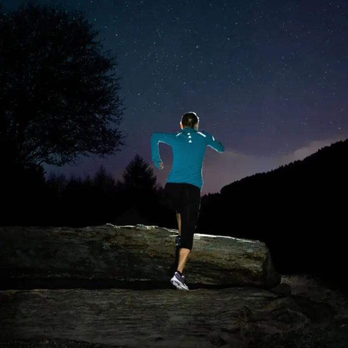Lifestyle image of Gear Aid Reflective Tenacious tape shown reflecting on a runner whilst out at night