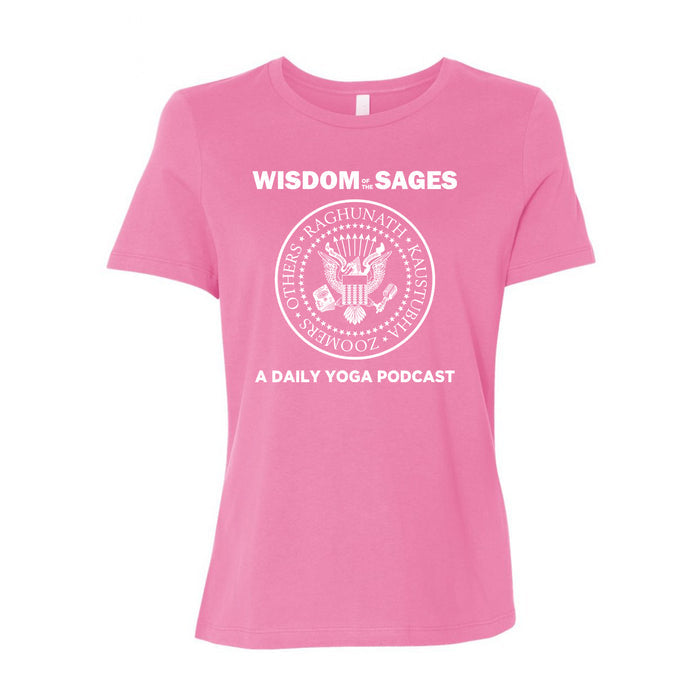 Wisdom Of The Sages pink T-shirt with white text: WISDOM OF THE SAGES above a circular emblem and A DAILY YOGA PODCAST below. Emblem features names: Raghunath, Kaushtubh, Others, Zoomers.