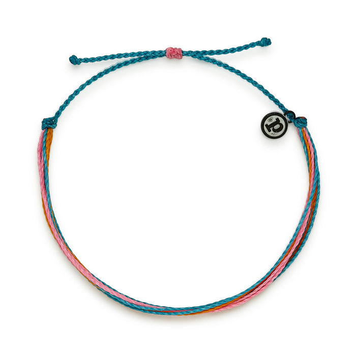 Original Anklet Tropic in rose gold tone with teal cords tiny white beads and colorful tassels.