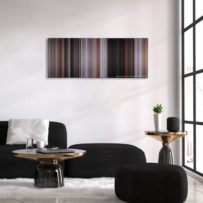 Planes, Trains & Automobiles color palette canvas above a black sofa with a gold-topped table