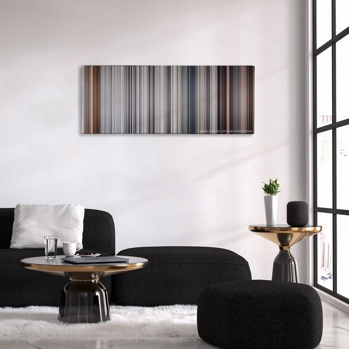 Pleasantville color palette canvas above a black sofa with a gold-topped table