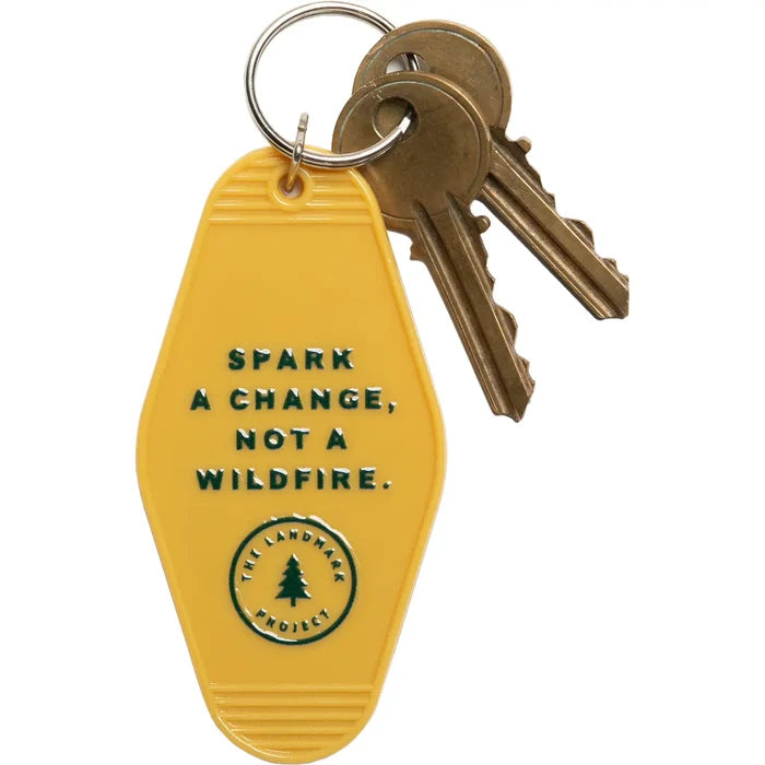 Yellow teardrop keychain with Smokey the Bear and the slogan Spark a Change Not a Wildfire.