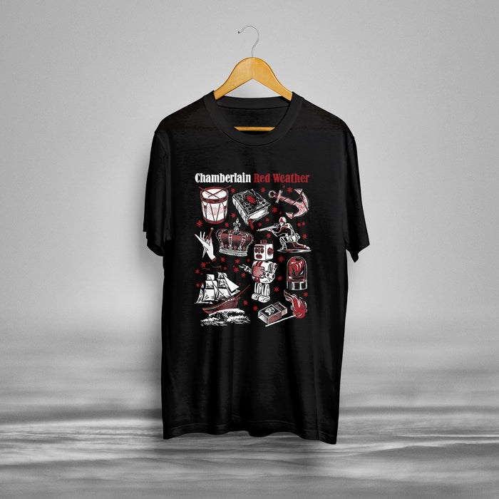 Black Chamberlain T-shirt on a hanger featuring illustrations of a drum, ship, heart, anchors, and skeleton. Chamberlain Red Weather is printed at the top in white and red letters.