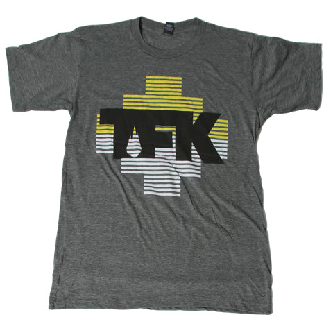 A heather gray Thousand Foot Krutch T-shirt with bold black TFK letters over a large cross and yellow and white horizontal stripes.