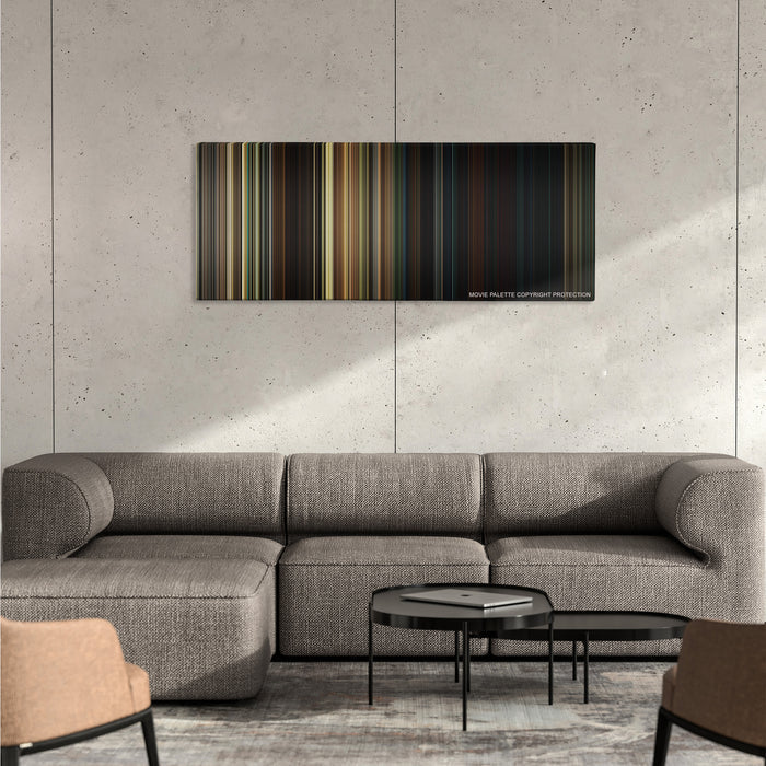 A Quiet Place color palette canvas on a concrete wall above a gray sectional sofa