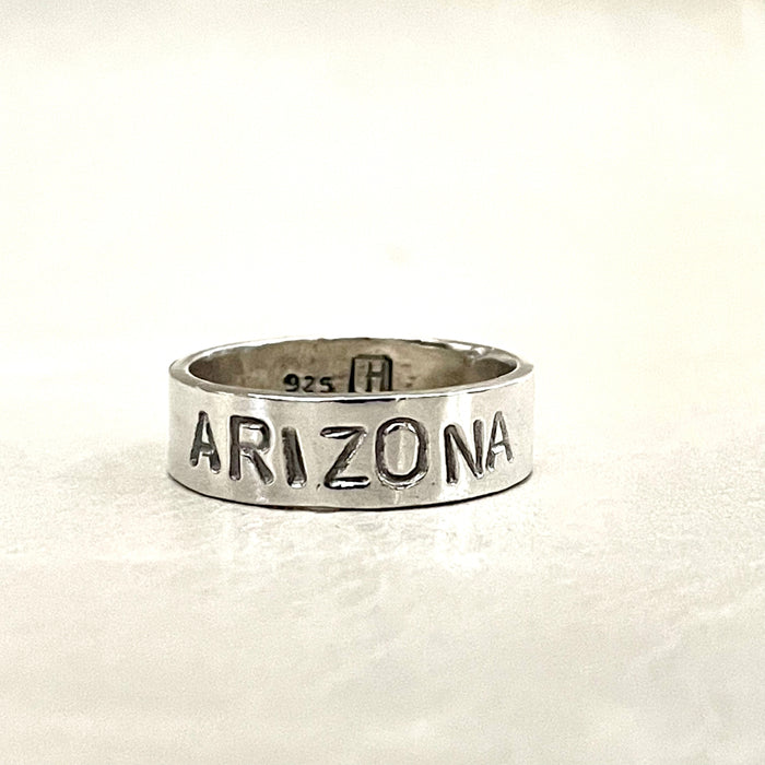 Wide silver Arizona ring with ARIZONA lettering around the band.