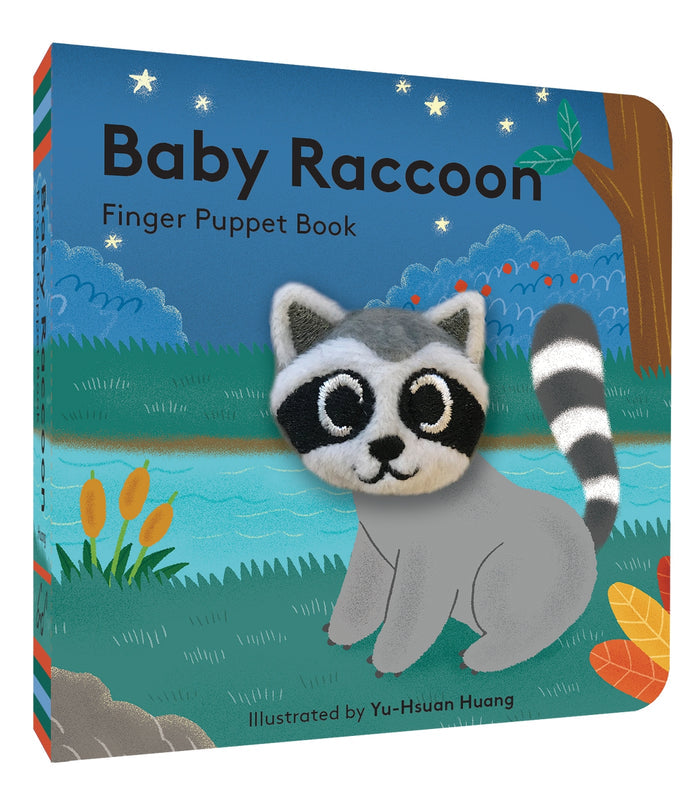 Angled view of Baby Raccoon Finger Puppet Book showing a plush raccoon on a colorful forest scene
