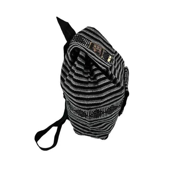 Side view of Baja Backpack in black and gray woven stripes with adjustable black straps