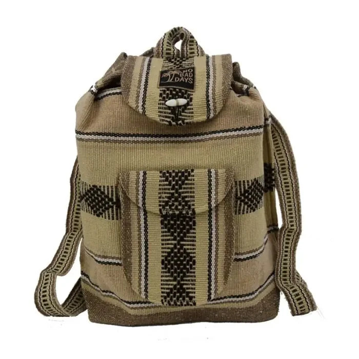 Oatmeal Baja backpack in beige with geometric pattern and a front pocket.