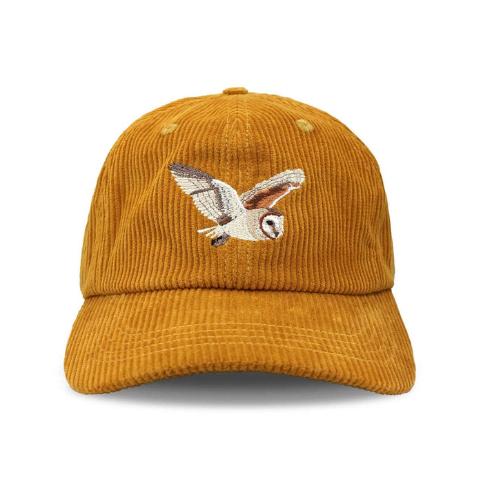 Mustard corduroy hat with an embroidered owl on the front