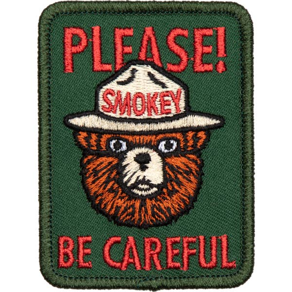 Embroidered patch featuring Smokey Bear wearing a ranger hat with the text PLEASE BE CAREFUL