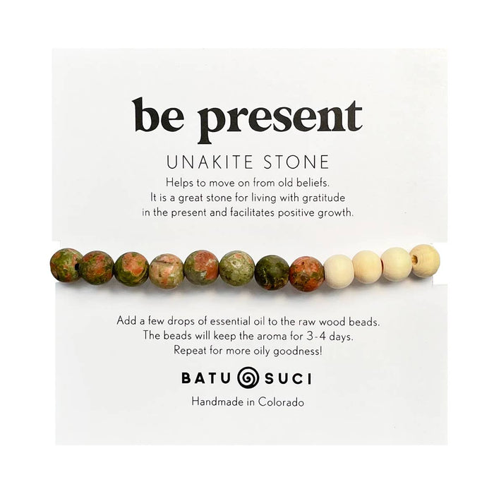 Be Present Unakite Stone Aromatherapy Bracelet displayed on a white card with a row of multicolor unakite beads.