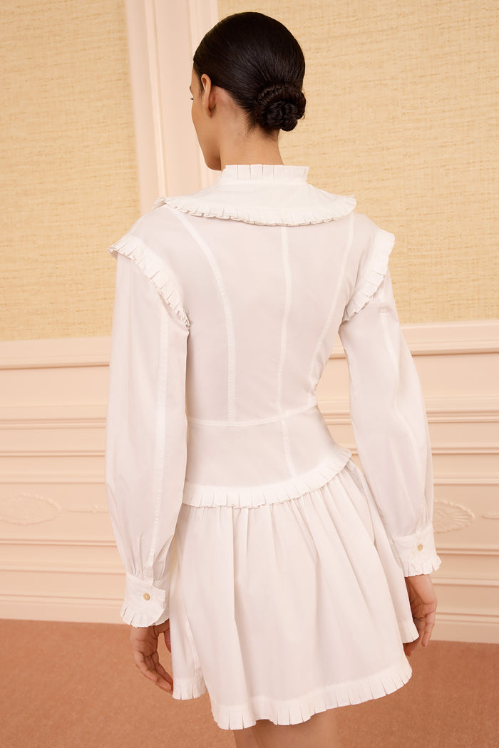 Beatrix Cowrie Cotton Mini Dress Pleated Ruffle Hem and Shoulder Detail - Back View | Ulla Johnson