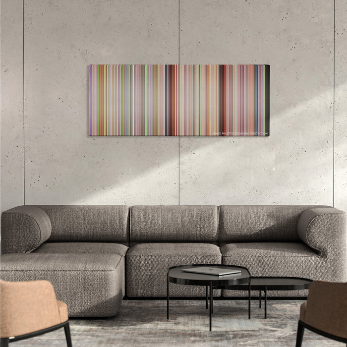 Bend It Like Beckham color palette canvas on a concrete wall above a gray sectional sofa