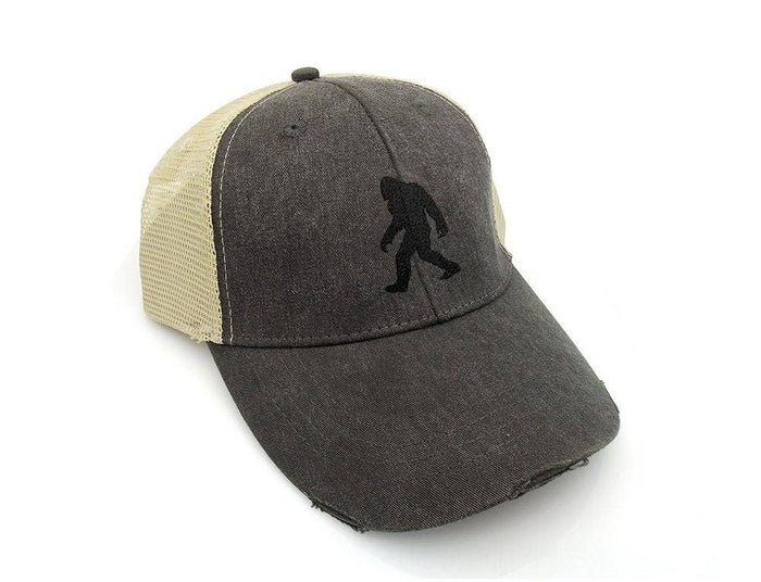 Bigfoot Trucker Hat with dark gray front panel beige mesh back and a black Bigfoot silhouette.