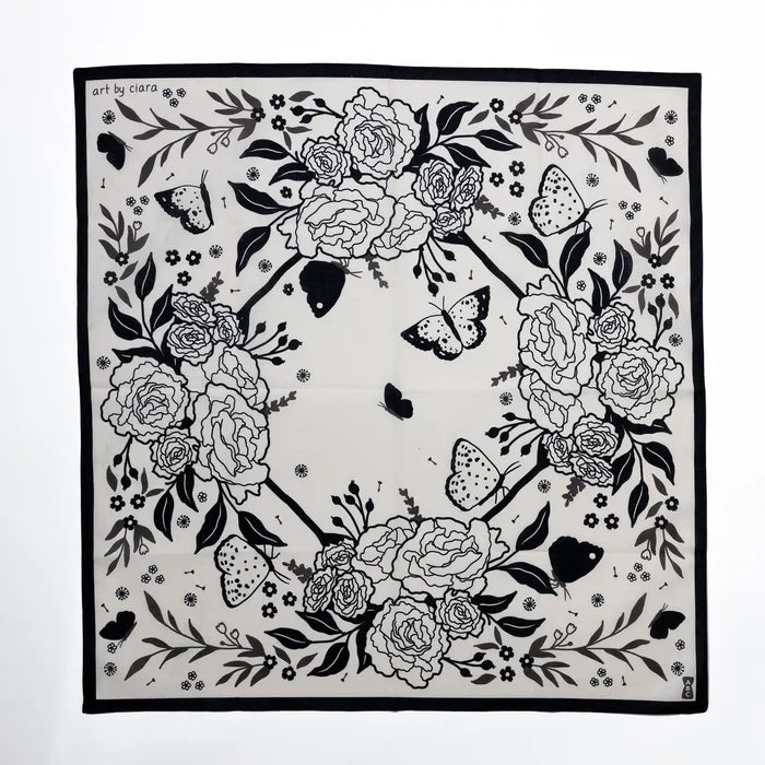 Black and white floral bandana with large roses and butterflies, bordered in black.
