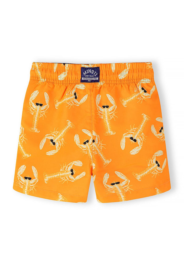 Boys swim shorts in orange with lobster print, back view, elasticated waistband.