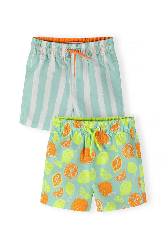Boys' 2-pack swim shorts in mint with lemon stripes and fruit print, front view.