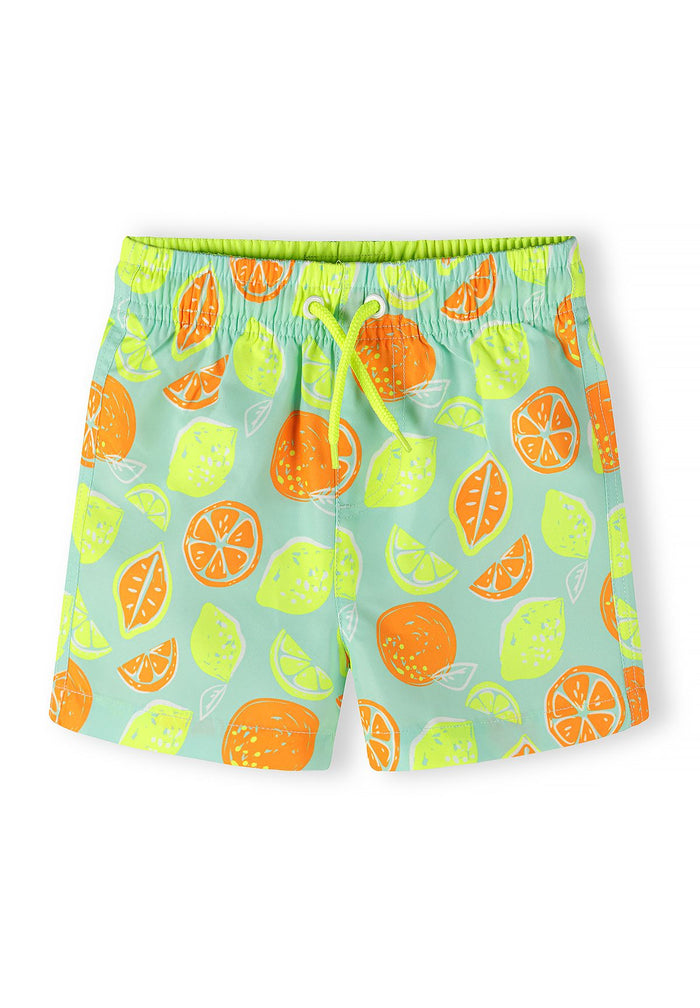 Boys' swim shorts in mint with lemon and orange fruit pattern, front view, elastic waistband.