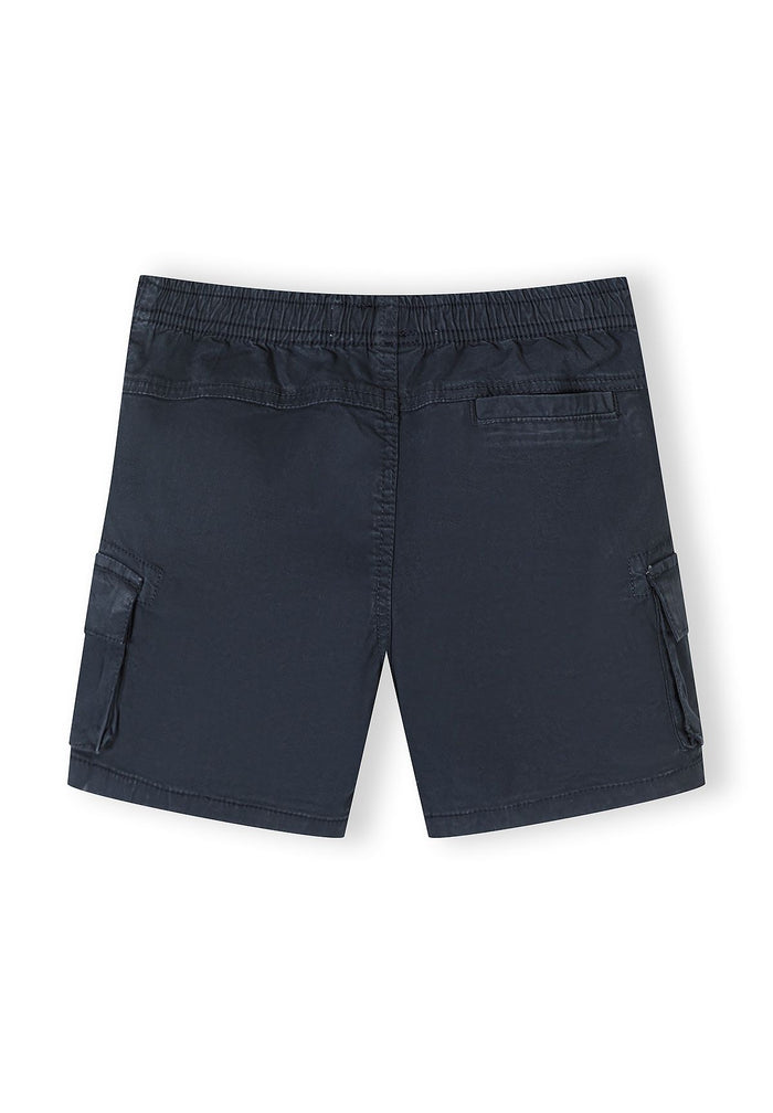 Back view of navy cargo shorts with adjustable waistband and side pockets.