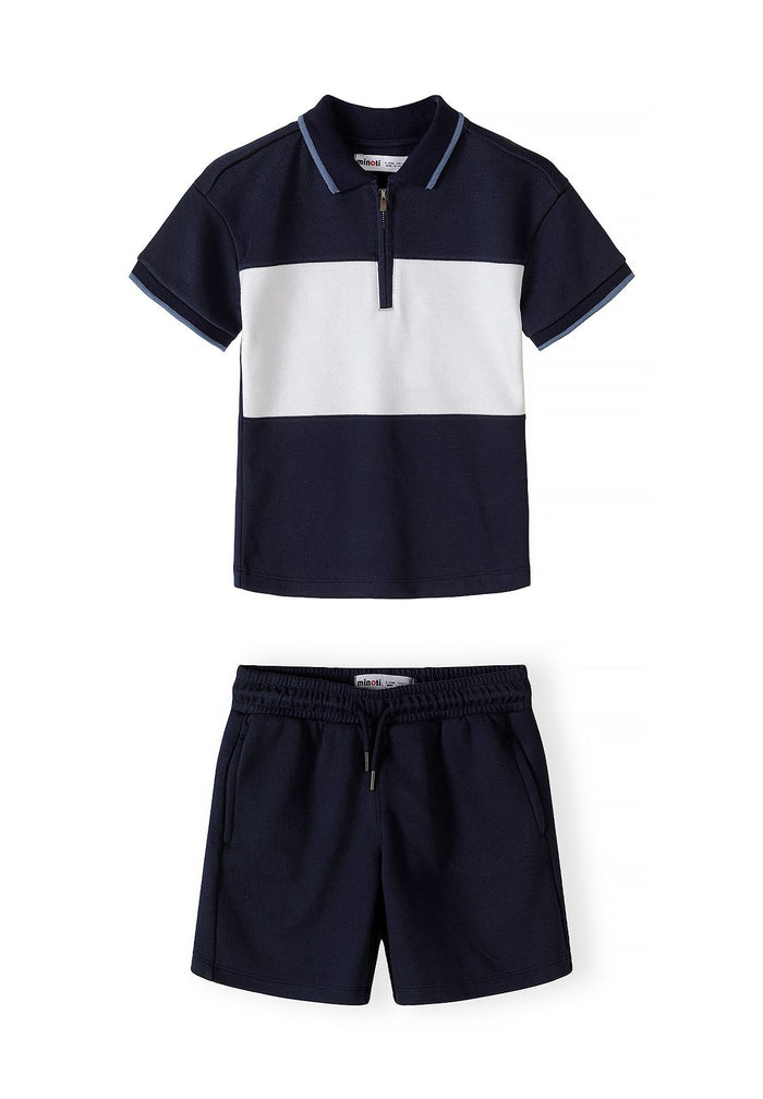Boys navy and white pique polo set with zip collar and shorts, front view.