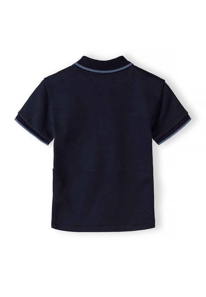 Boys navy pique polo top back view with zip collar and short sleeves.
