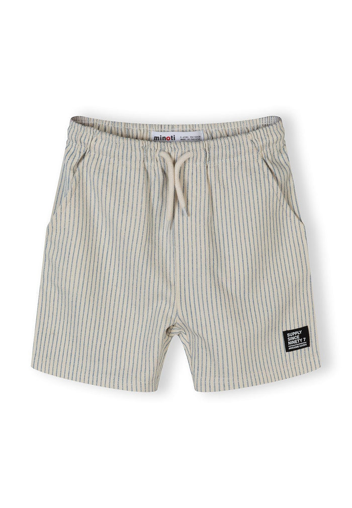 Detail of boys' striped shorts with elastic waistband and logo badge.