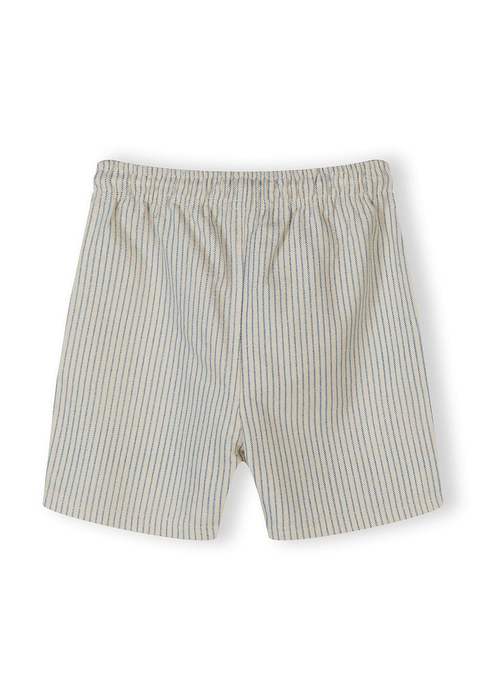Detail of boys' striped shorts with elastic waistband.