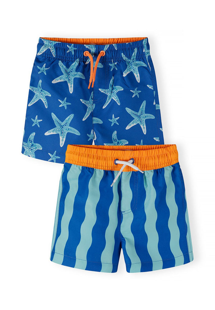 Boys swimming shorts in royal blue with starfish print, front view, featuring an elasticated waistband.