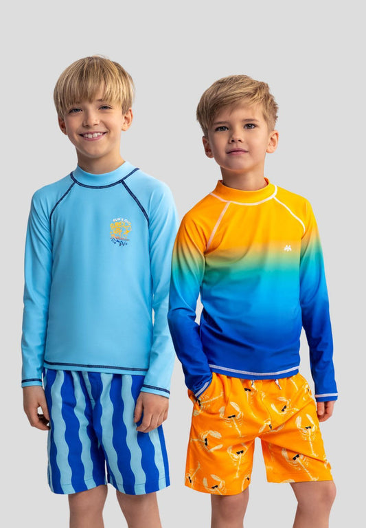 Boys long sleeve rash vest in turquoise and orange, featuring a stand collar and side pockets.