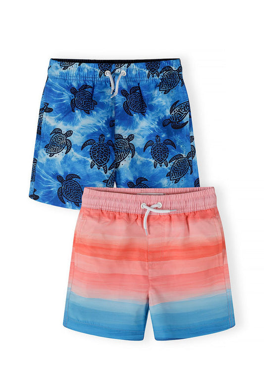 Boys' quick-drying swimming shorts in blue with turtle print and orange striped shorts, front view.