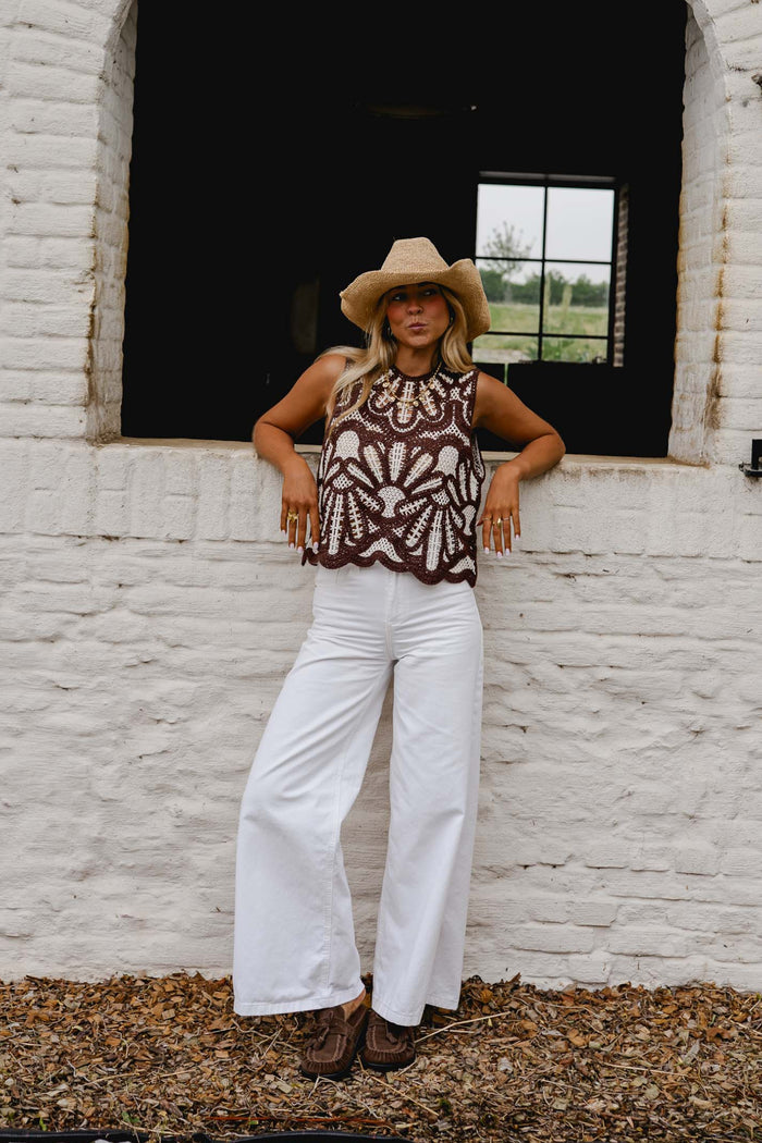 Two-tone crochet top styled with white jeans