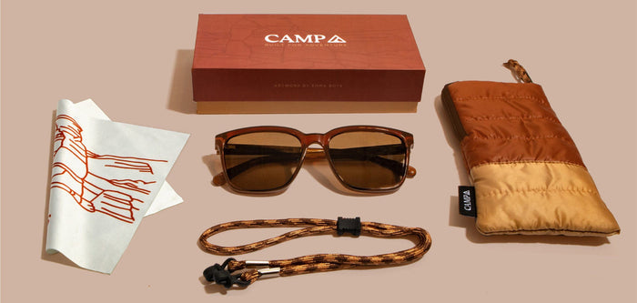 Arches Edition CAMP Crag sunglasses flat lay with box protective pouch braided cord and line art print
