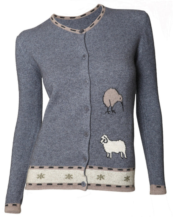 A gray cardigan with a kiwi patch on the front, featuring a round neckline and short sleeves. Possum fur is visible on the cuffs.