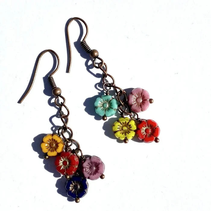 Cascade Flower Dangle Earrings with multicolor flower charms on bronze chains