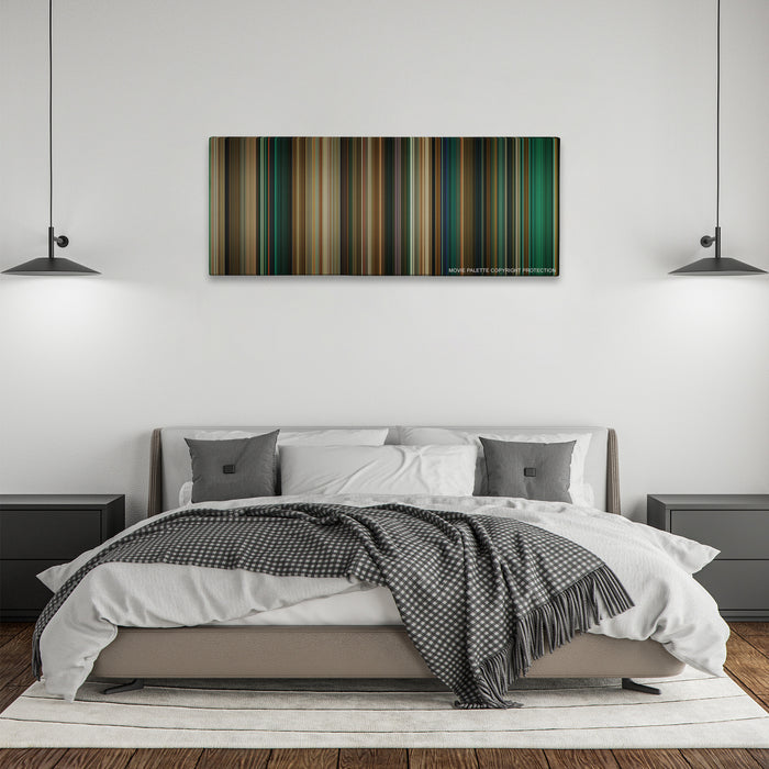 Catwoman color palette canvas above a bed, between two black pendant lamps