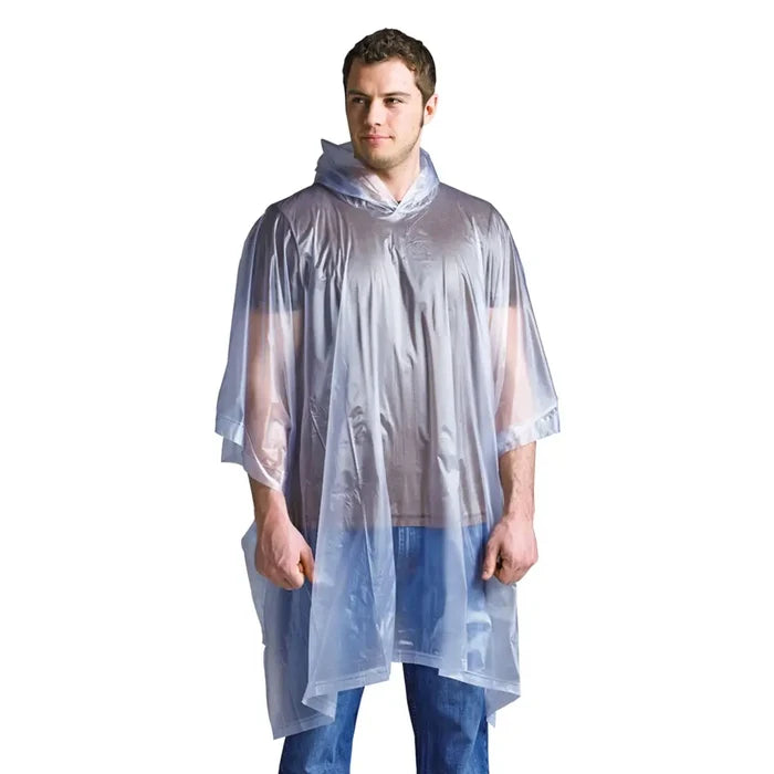 Man wearing a clear plastic rain poncho on a white background