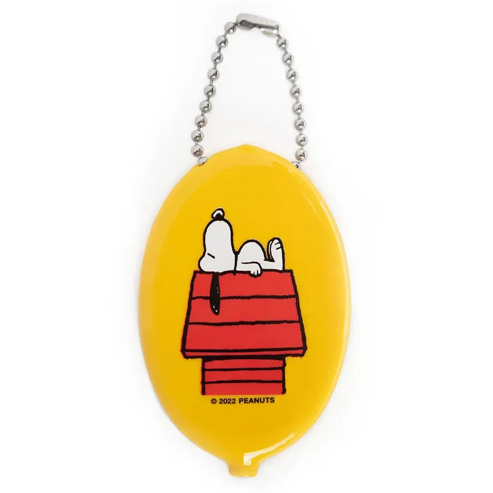 Yellow oval coin pouch featuring Snoopy resting on his red doghouse with a metal ball chain