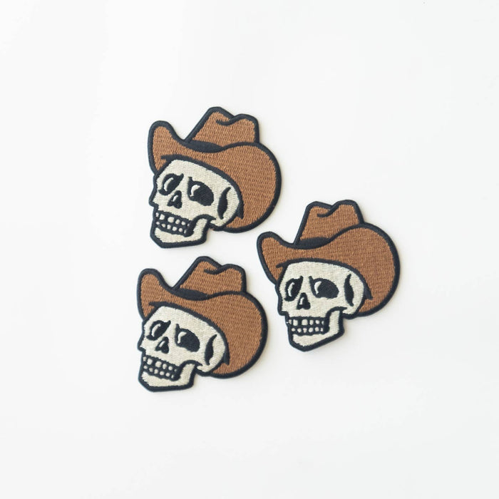 Group of three cowboy skull patches with brown cowboy hats