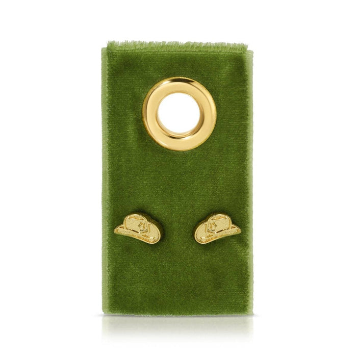 Gold cowgirl hat stud earrings on a green velvet display
