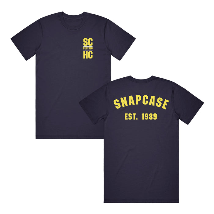 Two black Snapcase t-shirts with yellow text: SC Buffalo HC on the left chest, and SNAPCASE EST. 1989 in large letters on the back.