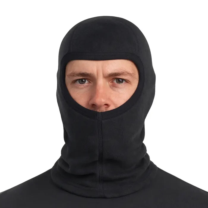 Head and shoulders shot of a man wearing a Sub Zero Factor 3 fleece peak balalclava in black on a white background