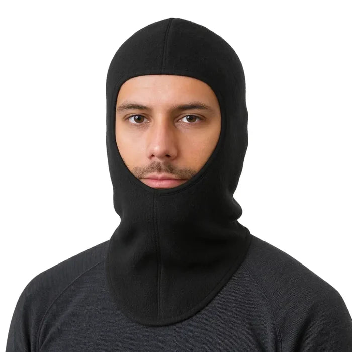 Head and shoulders shot of a man wearing a Sub Zero Factor 3 polyester balaclava in black on a white background