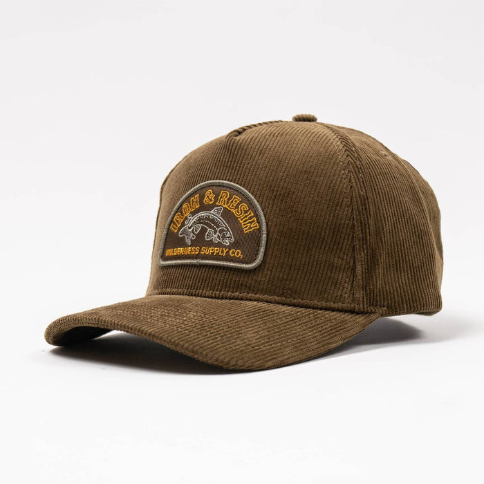 Brown corduroy Fisher hat with an embroidered patch showing a fish and wilderness scene.