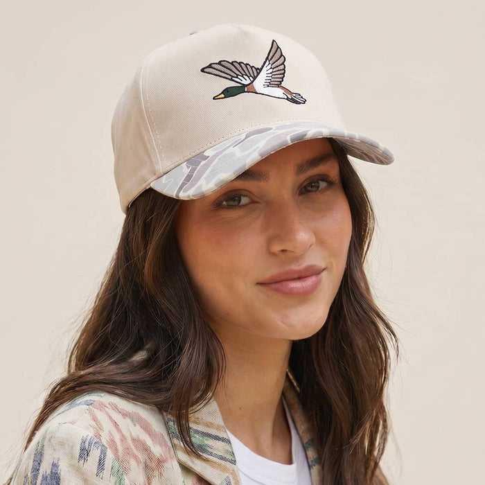 Beige trucker hat with camo brim and flying mallard embroidery