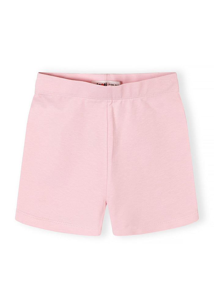 Close-up of pink bicycle shorts with elasticated waistband for girls.