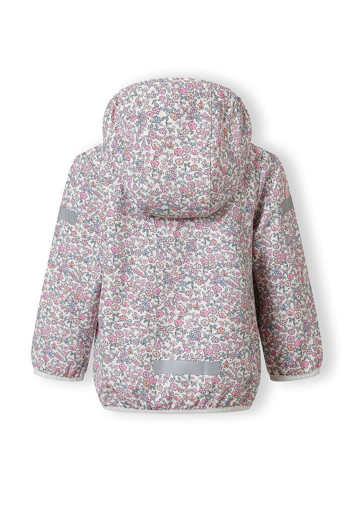 Girls softshell jacket with floral print, back view, features attached hood and elastic cuffs.