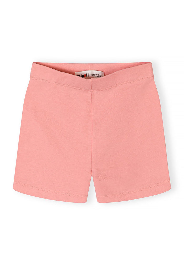 Girls cotton stretch bike shorts in pastel pink, front view, elasticated waistband.